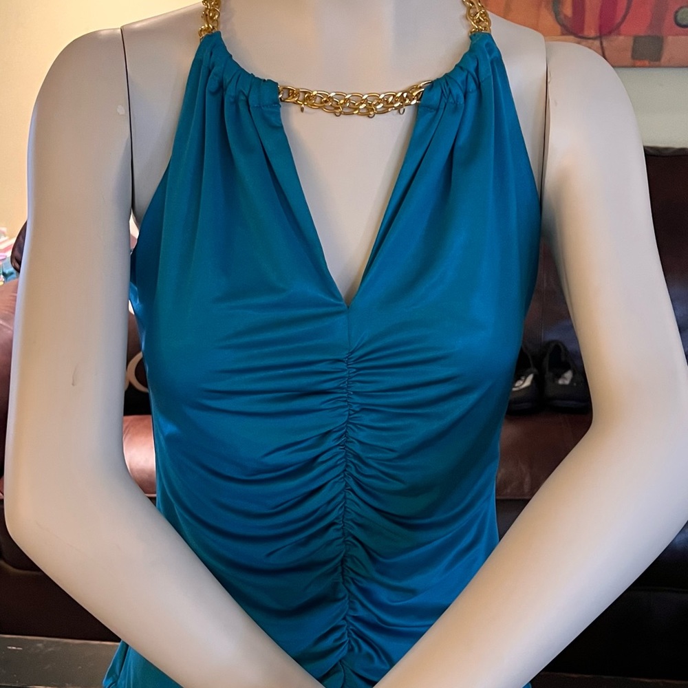 It’s time to get ready for the Holidays!! Beautiful turquoise Cache top